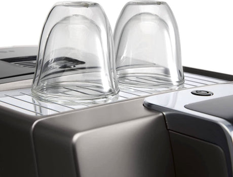 CLICCK Home Store DeLonghi double wall espresso glasses placed upside down on a coffee machine