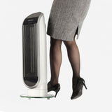 Dimplex Heater Fan Adjustable Thermostat standing next to woman in gray skirt and black heels