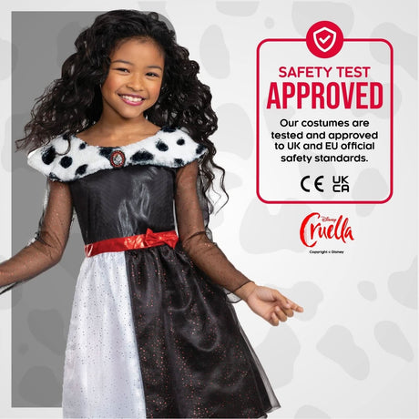 Smiling girl wearing Disney Villain Cruella costume with black and white dress and red belt