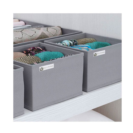 CLICCK Home Store gray foldable drawer organizer set with neatly folded clothes for efficient storage