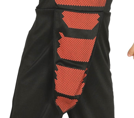 Close-up of black and red child cobra ninja costume with scaled pattern detail on the front