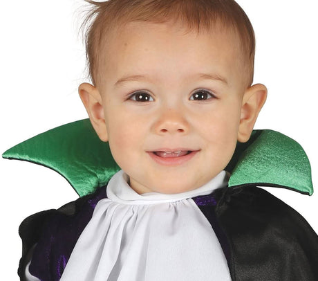 Toddler vampire costume with green collar and black cape by Infant Fancy Dress on smiling baby