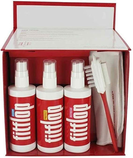 Fitflop boot cleaning kit with three spray bottles, brush, and cloth in red and white packaging
