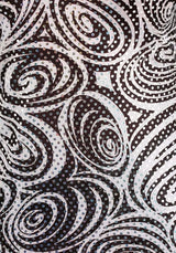 Close-up of black and white swirl pattern fabric with shiny sequins for Foxy Lady Disco Costume XL