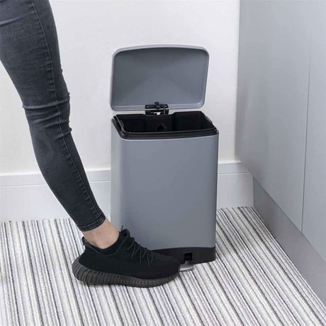 Calitek 12 litre pedal waste bin in grey with foot pedal for hands-free opening in a kitchen