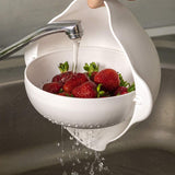 Calitek detachable colander and bowl set washing fresh strawberries under kitchen faucet