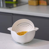 Calitek detachable colander and bowl set in white with yellow lentils inside on kitchen counter