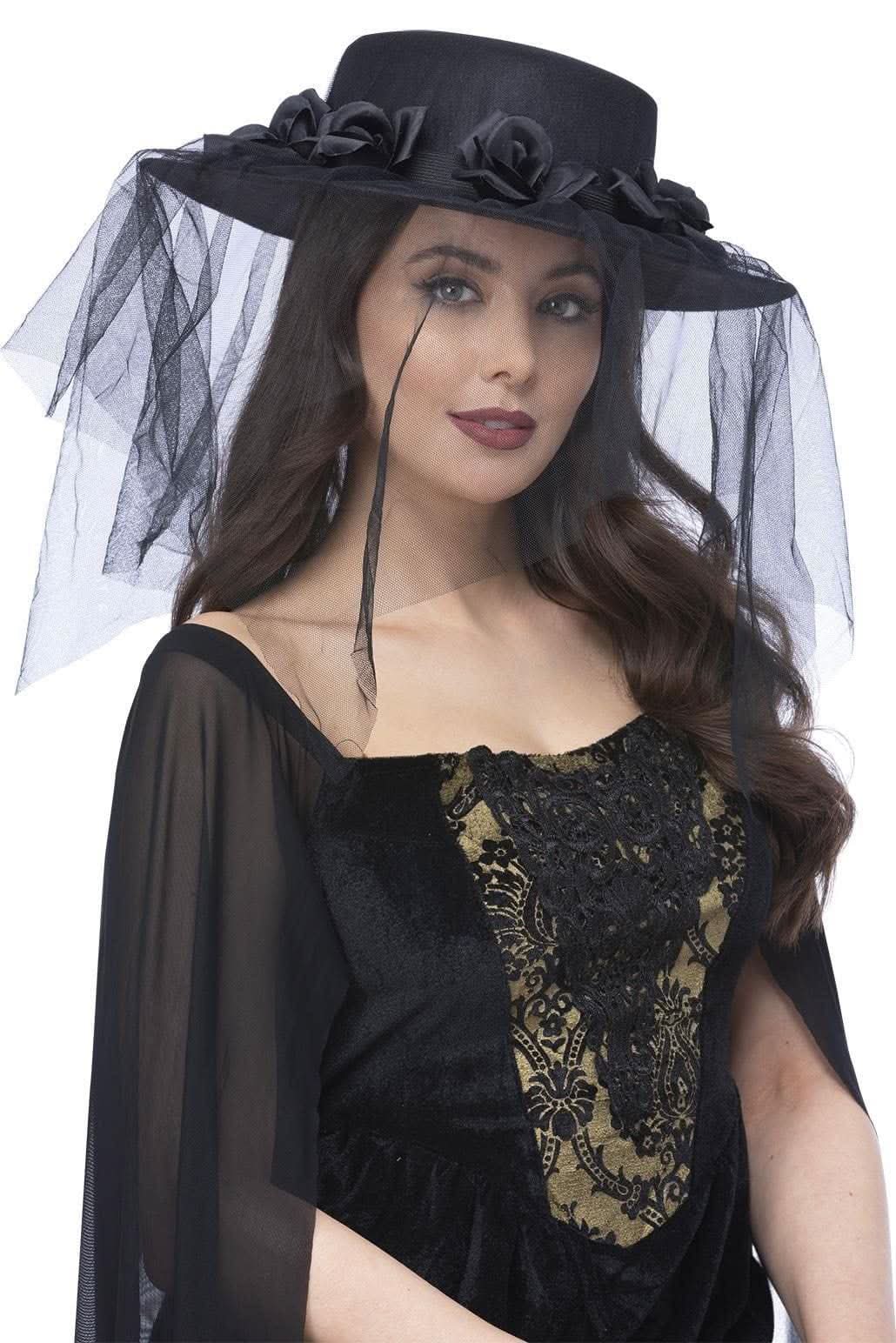 Woman wearing a black gothic funeral hat with floral decorations and sheer veil by Fancy Dress