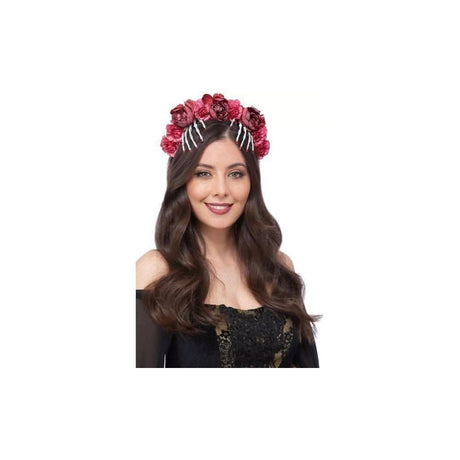 Woman wearing a gothic rose headband with red roses and silver accents on dark hair