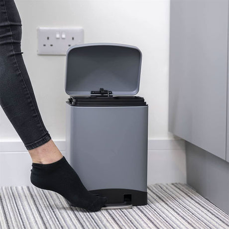 Calitek 6L pedal bin with soft close lid in gray being used in a modern kitchen