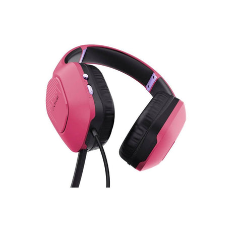 Pink gaming headset and mouse bundle showing pink wired over-ear headphones with cushioned black ear pads