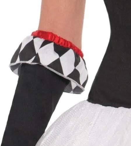 Close-up of sleeve detail on Harlequin jester costume women with black and white diamond pattern and red trim