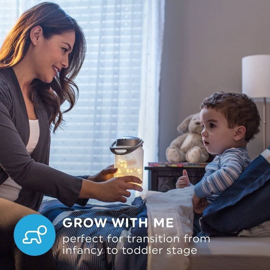 Homedics fairy lights lantern held by a mother, creating a cozy atmosphere for her child at bedtime