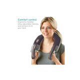 Woman using Homedics neck massager with heat featuring ergonomic handles for adjustable intensity and comfort