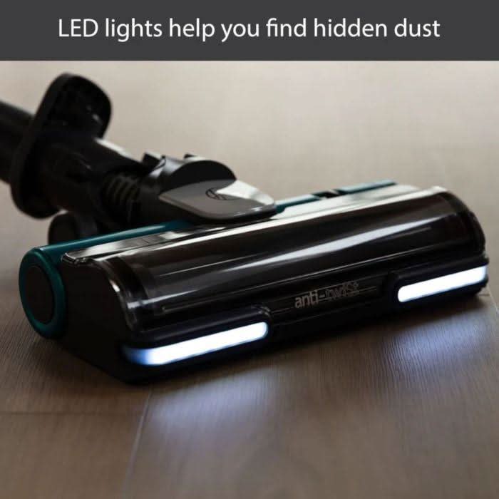 Cordless vacuum cleaner for home with LED lights to help find hidden dust on hardwood floor