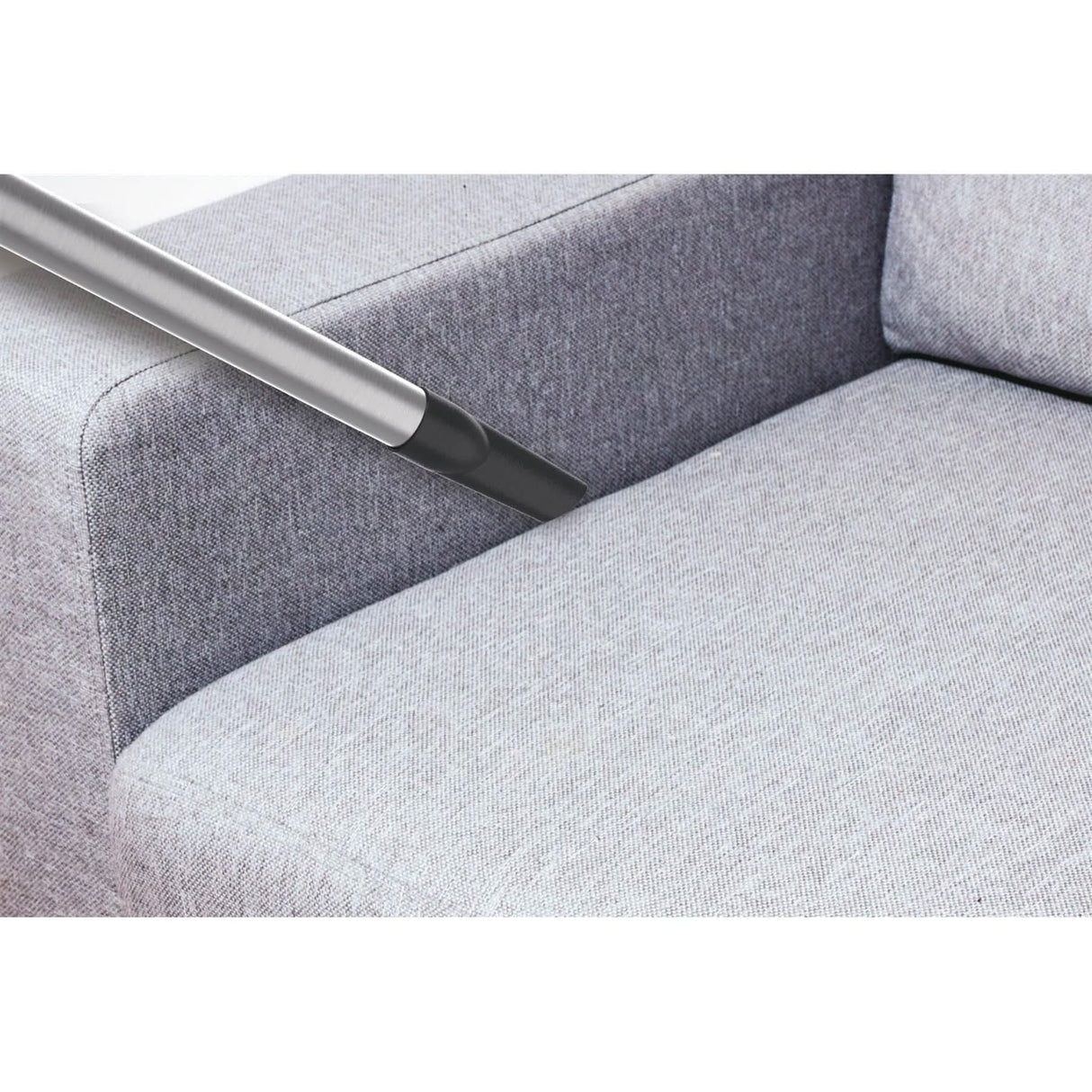 Hoover pet vacuum cleaner cylinder Attachment cleaning pet hair from a grey sofa