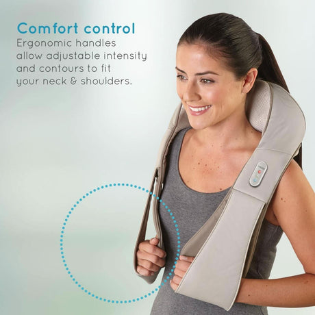 Woman using Homedics infrared neck massager with heat featuring ergonomic handles for neck and shoulder comfort