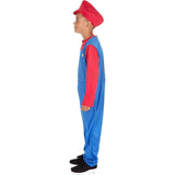 Child wearing Italian plumber costume for kids with red hat and blue overalls standing in profile