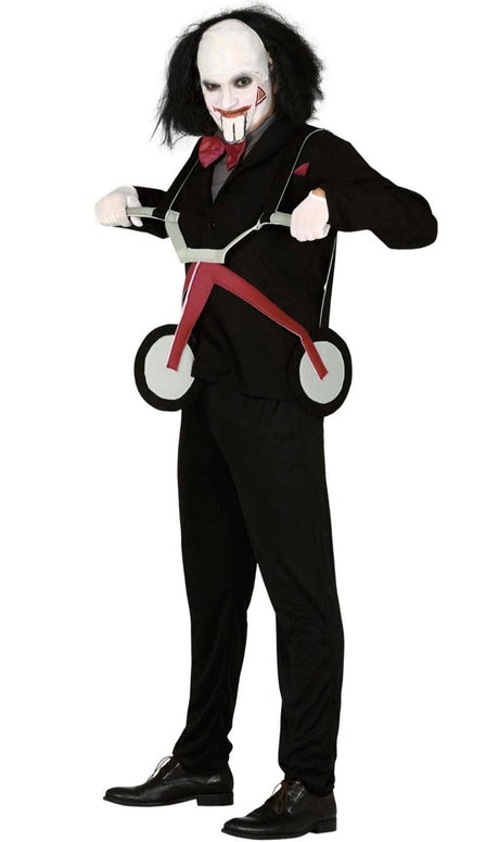 Man wearing a Jigsaw inspired costume with white mask, black suit, red bow tie, and tricycle prop