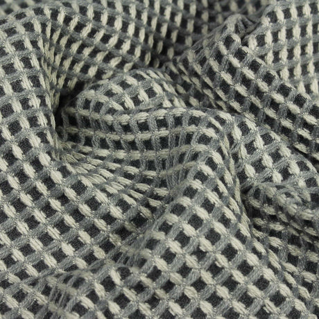 Close-up of luxury waffle throw charcoal grey fabric texture from CLICKK Home Store