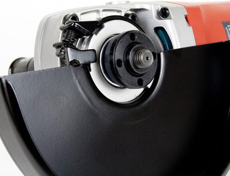 Close-up view of Makita 230mm angle grinder showing disc guard and spindle assembly