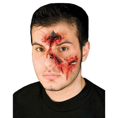 Metal attack stage makeup showing realistic bloody wound and metal shards on male face by Fancy Dress
