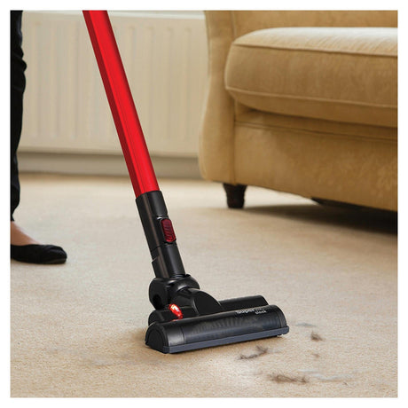 Morphy Richards cordless vacuum in action, cleaning carpet with effective suction on dirt and debris