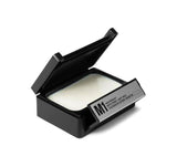 Patricks M1 light hold gel in black square container with open lid showing white gel inside