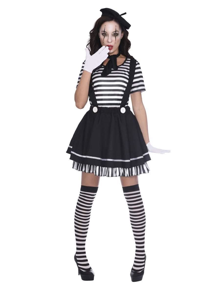 Woman wearing plus size French mime costume with striped top, suspenders, skirt, beret, and gloves