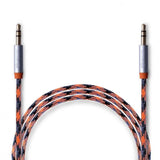 CLICCK Home Store 24K gold aux cable with braided orange and black nylon exterior and metal connectors