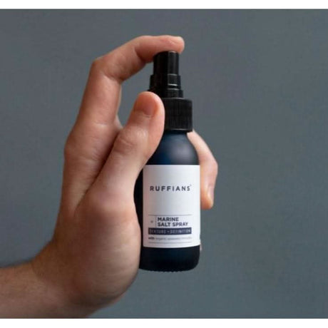 Ruffians Marine Salt Spray in a black bottle for textured and defined hairstyles