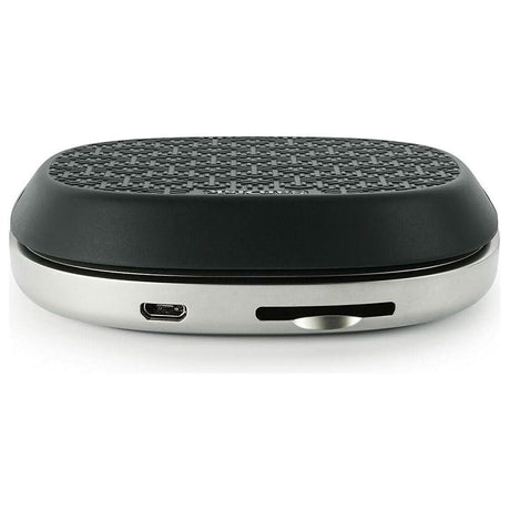 SanDisk iXpand charging base with sleek design for convenient device charging and storage