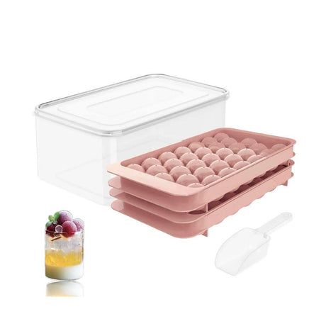CLICCK Home Store mini sphere ice cube tray set with pink silicone molds, clear storage container, and scoop