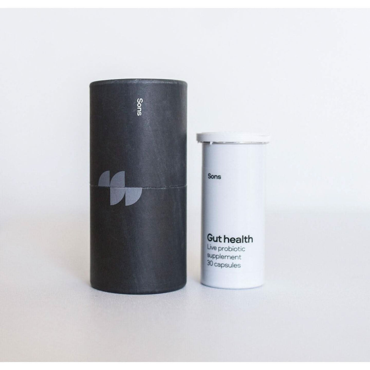 CLICCK Home Store gut health capsule deals with live probiotic supplement in black and white packaging
