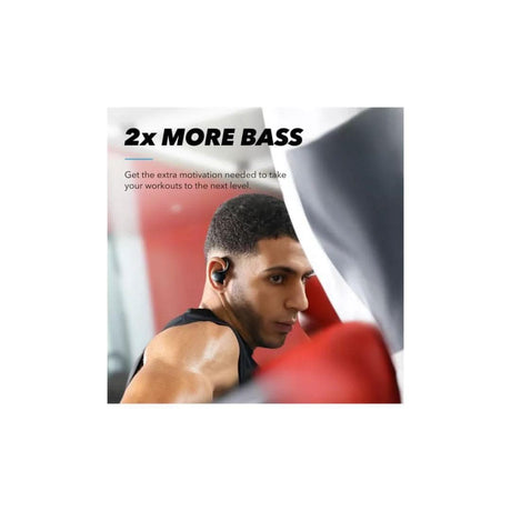 Man wearing Soundcore Sport X10 wireless headphones with 2x more bass for enhanced workout motivation