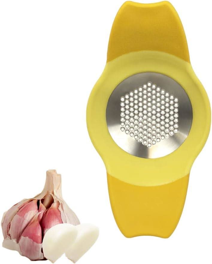 Calitek yellow stainless steel garlic rocker with garlic cloves and bulb for easy crushing