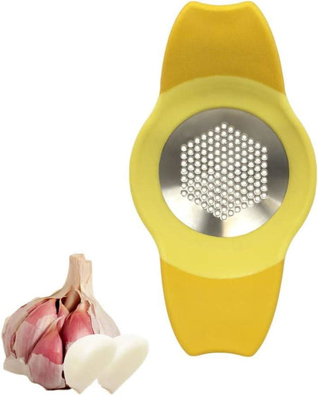 Calitek yellow stainless steel garlic rocker with garlic cloves and bulb for easy crushing