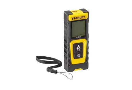 Stanley laser distance measurer with digital display and wrist strap for precise measurements