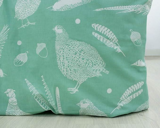 CLIKK Home Store superking reversible duvet cover with green fabric and white bird and feather pattern