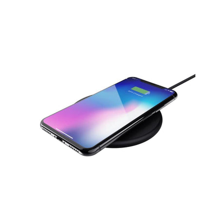 CLICKK Home Store 15W wireless charger with smartphone on black charging pad