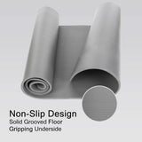 Gray non slip yoga mat for home workouts with solid grooved floor and gripping underside