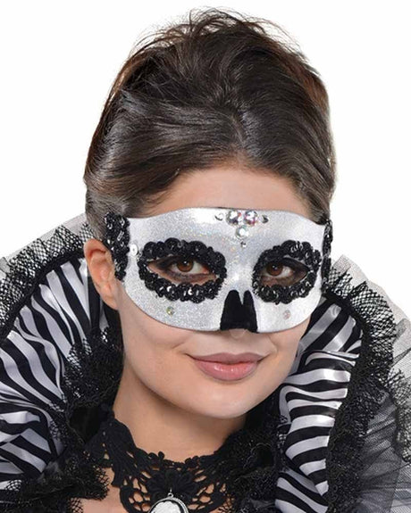Venetian skull mask for adults in white with black sequins and decorative rhinestones
