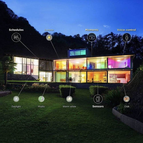 Modern house lit with colorful smart lighting demonstrating features of WiZ GU10 smart bulb including schedules and voice control
