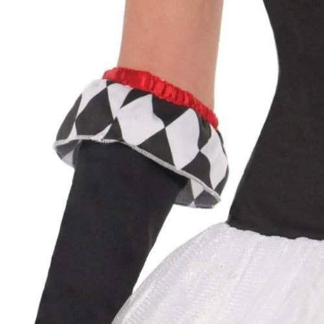 Close-up of Women's Harlequin Costume sleeve with black and white diamond pattern and red trim