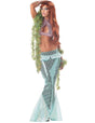 Woman wearing a women's mermaid costume with a shimmery tail skirt and sequin halter top