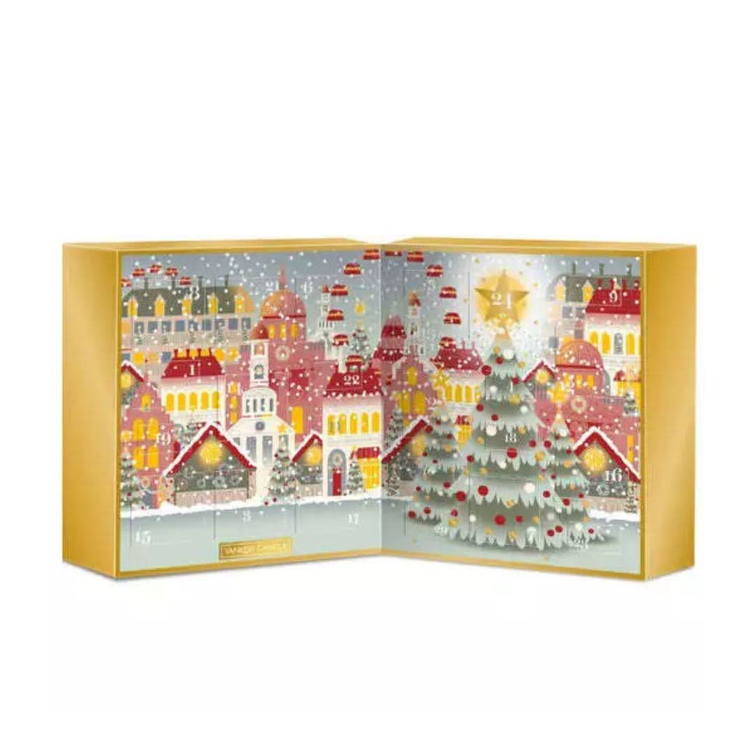 Yankee Candle advent calendar with festive holiday village and Christmas tree design