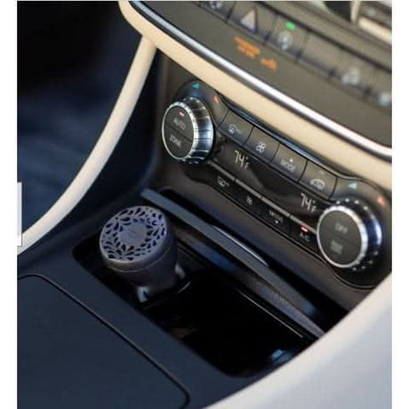 Yankee Candle Midsummers Night car fragrance diffuser in a sleek car console