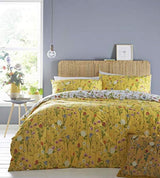 Yellow duvet cover super king with floral pattern in bright bedroom setting from CLICKK Home Store